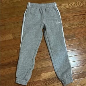 Grey Adidas striped jogger pants